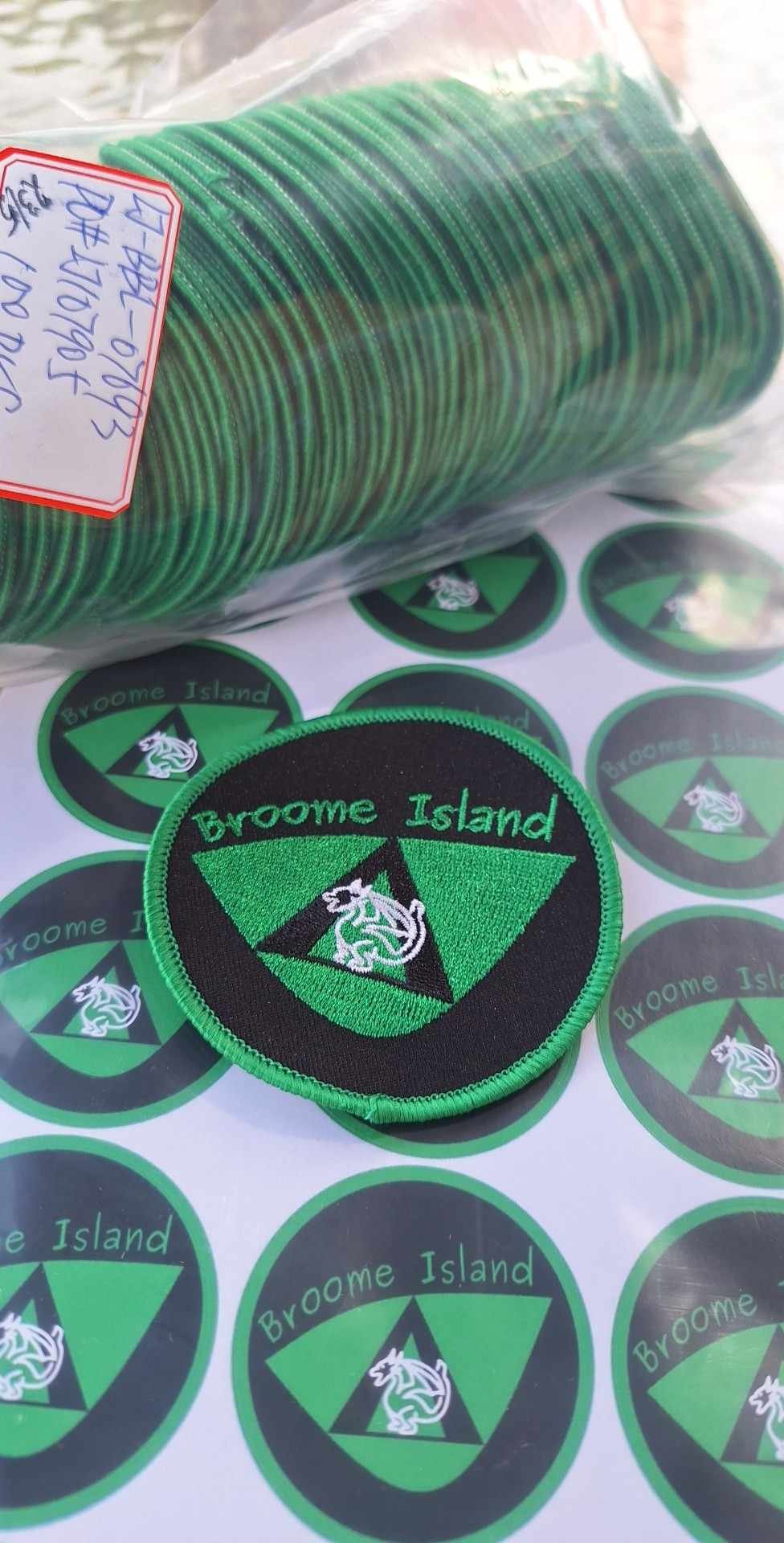 A selection of Broome Island badges and stickers